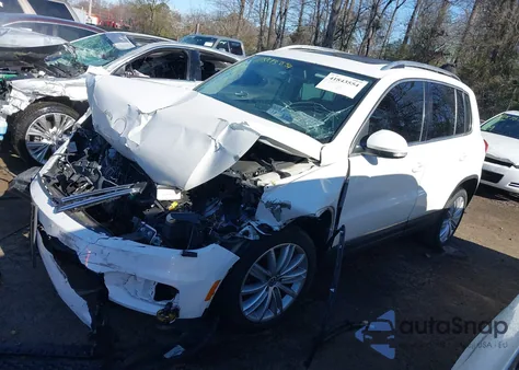 2014 Volkswagen Tiguan Sel from USA, damaged, VIN WVGBV3AX5EW535459